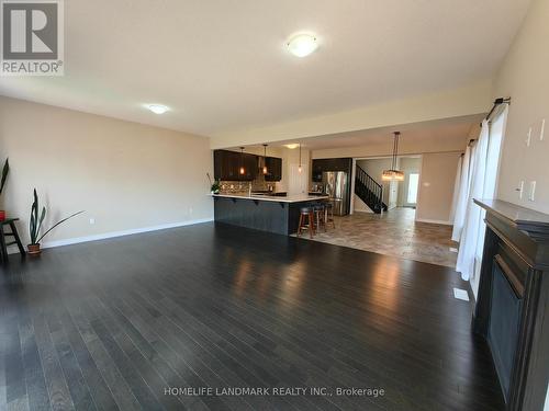 7 Dudley Drive, Guelph, ON - Indoor Photo Showing Living Room With Fireplace