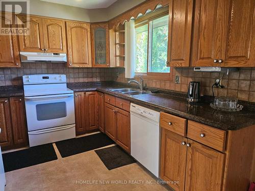 64 Brimley Court, Belleville, ON - Indoor Photo Showing Kitchen With Double Sink