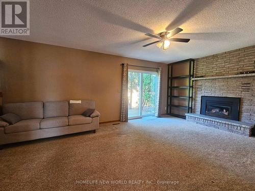 64 Brimley Court, Belleville, ON - Indoor Photo Showing Living Room With Fireplace