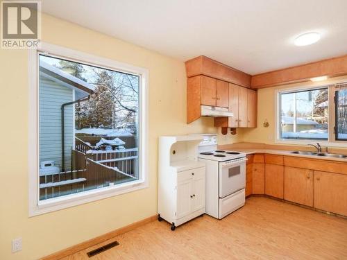 60 Klondike Road, Whitehorse, YT - Indoor Photo Showing Kitchen With Double Sink