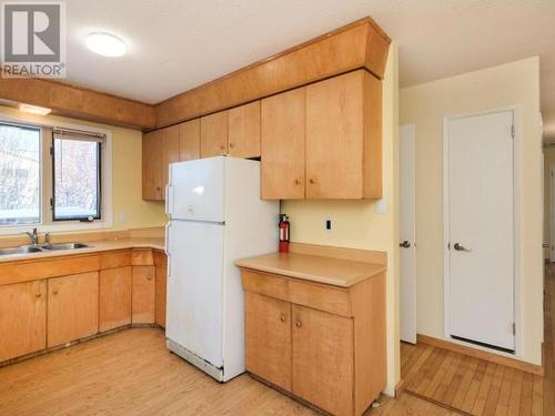 60 Klondike Road, Whitehorse, YT - Indoor Photo Showing Kitchen With Double Sink