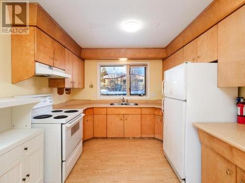 60 Klondike Road, Whitehorse, YT - Indoor Photo Showing Kitchen With Double Sink