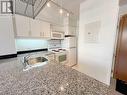 609 - 33 Sheppard Avenue E, Toronto, ON  - Indoor Photo Showing Kitchen 