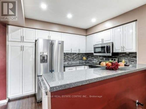 304 - 60 Barondale Drive W, Mississauga, ON - Indoor Photo Showing Kitchen With Upgraded Kitchen