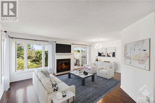 6154 Heritage Park Crescent, Ottawa, ON - Indoor Photo Showing Living Room With Fireplace