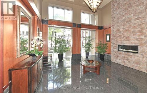 701 - 750 Bay Street, Toronto, ON - Indoor Photo Showing Other Room With Fireplace