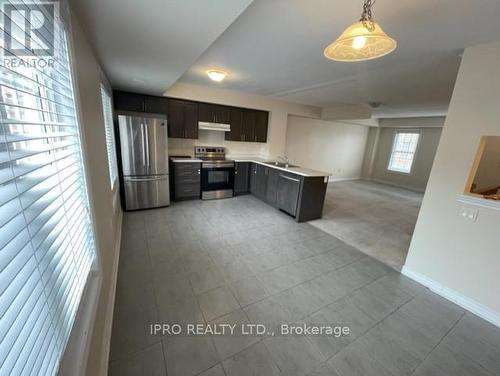 96 - 2280 Baronwood Drive N, Oakville, ON - Indoor Photo Showing Kitchen With Stainless Steel Kitchen