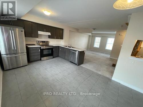 96 - 2280 Baronwood Drive N, Oakville, ON - Indoor Photo Showing Kitchen With Stainless Steel Kitchen With Double Sink