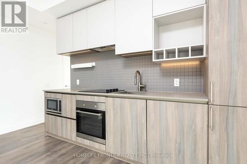 2012 - 950 Portage Parkway, Vaughan, ON - Indoor Photo Showing Kitchen With Upgraded Kitchen