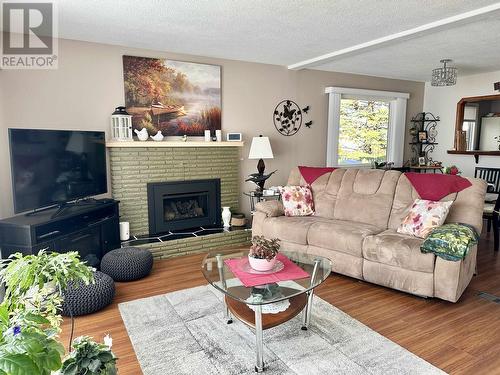 178 Ivy Street, Prince George, BC - Indoor Photo Showing Living Room With Fireplace