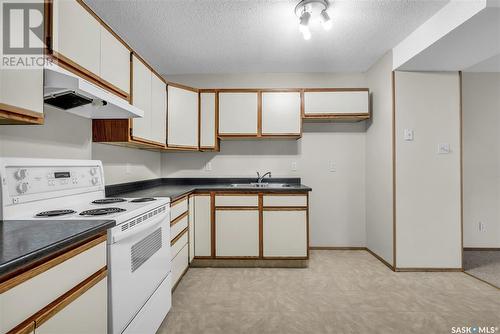 1640A Central Avenue, Saskatoon, SK - Indoor Photo Showing Kitchen With Double Sink