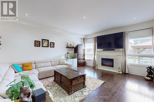 195 Aishford Road, Bradford West Gwillimbury, ON - Indoor Photo Showing Living Room With Fireplace