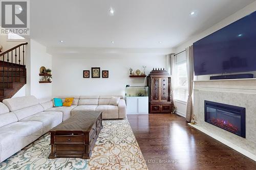 195 Aishford Road, Bradford West Gwillimbury, ON - Indoor Photo Showing Living Room With Fireplace