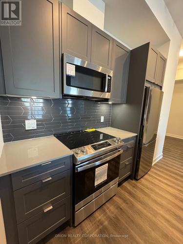 902 - 4130 Parkside Village Drive, Mississauga, ON - Indoor Photo Showing Kitchen With Stainless Steel Kitchen With Upgraded Kitchen