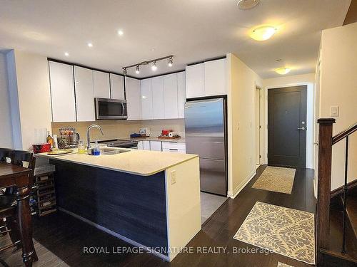 108-5025 Four Springs Ave, Mississauga, ON - Indoor Photo Showing Kitchen With Double Sink