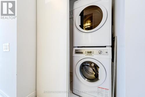 703 - 42 Charles Street E, Toronto, ON - Indoor Photo Showing Laundry Room