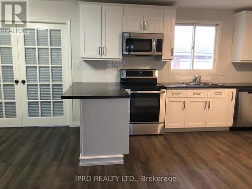 1 - 6785 Margaret Street, Niagara Falls, ON - Indoor Photo Showing Kitchen With Stainless Steel Kitchen With Double Sink