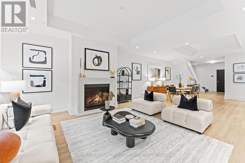 102 - 36 Birch Avenue, Toronto, ON - Indoor Photo Showing Living Room With Fireplace