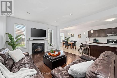 3245 Jinnies Way, London, ON - Indoor Photo Showing Living Room With Fireplace