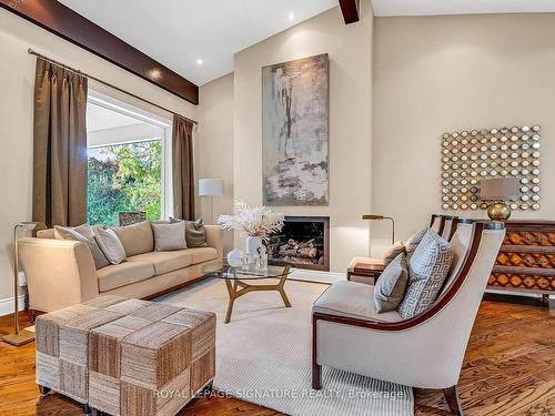 100 Three Valleys Dr, Toronto, ON - Indoor Photo Showing Living Room With Fireplace