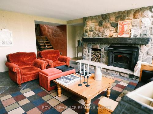 793493 Third Line, Mono, ON - Indoor Photo Showing Living Room With Fireplace