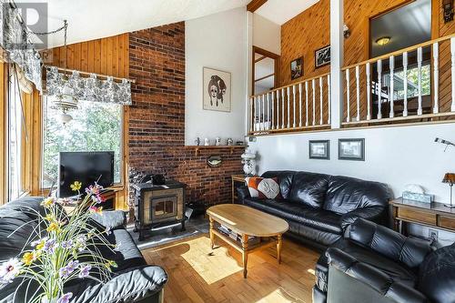 8 Walker Ln, Huron Shores, ON - Indoor Photo Showing Living Room With Fireplace