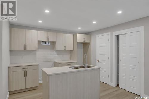 243 St John Street, Regina, SK - Indoor Photo Showing Kitchen With Double Sink