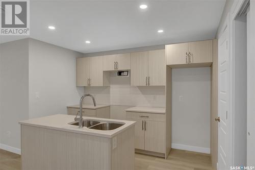 243 St John Street, Regina, SK - Indoor Photo Showing Kitchen With Double Sink