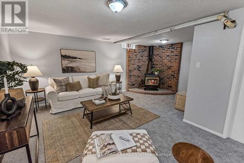 17 - 700 Harmony Road N, Oshawa (Pinecrest), ON - Indoor Photo Showing Living Room With Fireplace