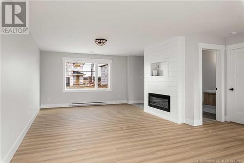 17 Foxtrot Street, Dieppe, NB - Indoor Photo Showing Living Room With Fireplace