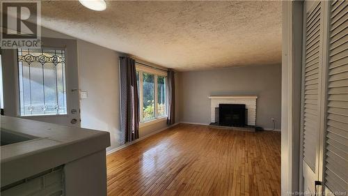 603 Wellington Street, Miramichi, NB - Indoor Photo Showing Living Room With Fireplace