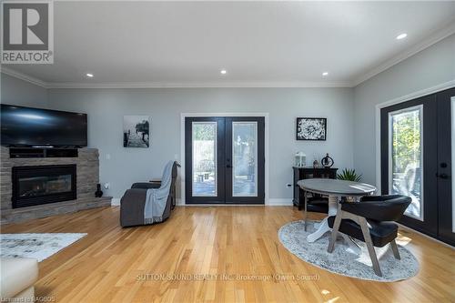 170 Lakeshore Road, Georgian Bluffs, ON - Indoor Photo Showing Living Room With Fireplace