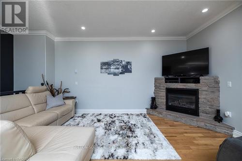 170 Lakeshore Road, Georgian Bluffs, ON - Indoor Photo Showing Living Room With Fireplace