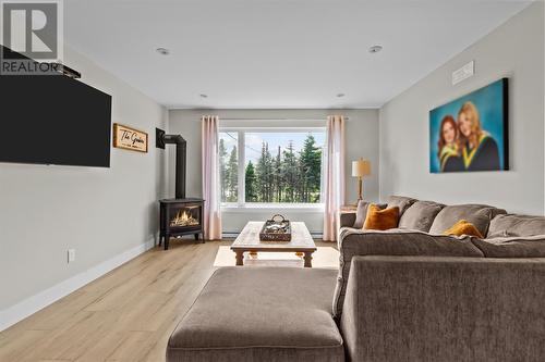 1 Todds Place, Flatrock, NL - Indoor Photo Showing Living Room With Fireplace