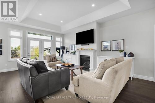 95 Brooker Trail, Thames Centre (Thorndale), ON - Indoor Photo Showing Living Room With Fireplace