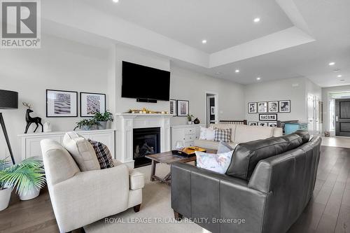 95 Brooker Trail, Thames Centre (Thorndale), ON - Indoor Photo Showing Living Room With Fireplace