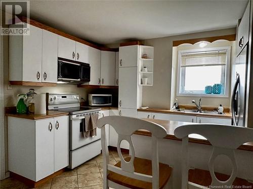 356 Sunset Drive, Dalhousie, NB - Indoor Photo Showing Kitchen With Double Sink