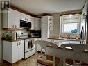 356 Sunset Drive, Dalhousie, NB  - Indoor Photo Showing Kitchen With Double Sink 