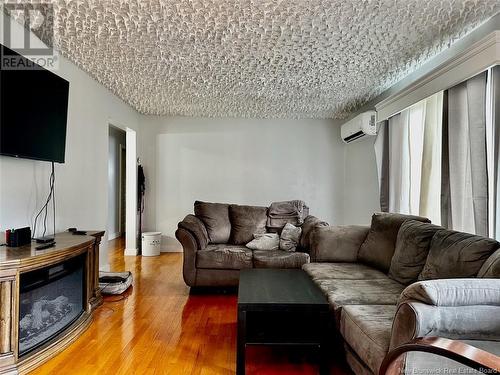 356 Sunset Drive, Dalhousie, NB - Indoor Photo Showing Living Room With Fireplace