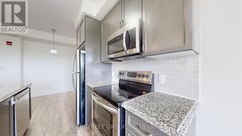 512 - 2 Adam Sellers Street, Markham, ON - Indoor Photo Showing Kitchen With Upgraded Kitchen