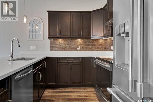 214 Stilling Union, Saskatoon, SK - Indoor Photo Showing Kitchen With Upgraded Kitchen