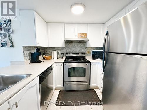 2057 - 75 George Appleton Way, Toronto, ON - Indoor Photo Showing Kitchen With Stainless Steel Kitchen