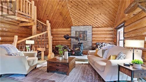 50 Chemin Duval, Petit-Paquetville, NB - Indoor Photo Showing Living Room With Fireplace