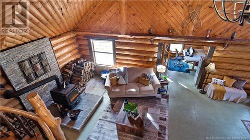 50 Chemin Duval, Petit-Paquetville, NB - Indoor Photo Showing Other Room With Fireplace