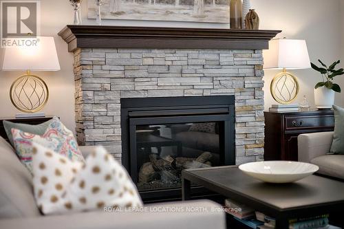 112 Admiral'S Trail, Blue Mountains, ON - Indoor Photo Showing Living Room With Fireplace