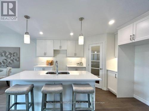 32 Riverstone Way, Belleville, ON - Indoor Photo Showing Kitchen With Double Sink With Upgraded Kitchen