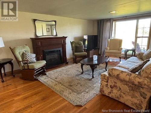 50 Collina Road, Collina, NB - Indoor Photo Showing Living Room With Fireplace