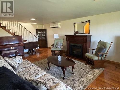 50 Collina Road, Collina, NB - Indoor Photo Showing Living Room With Fireplace