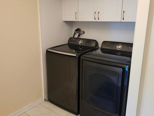 Salle de lavage - 144 Rue Landry, Saint-Eustache, QC - Indoor Photo Showing Laundry Room