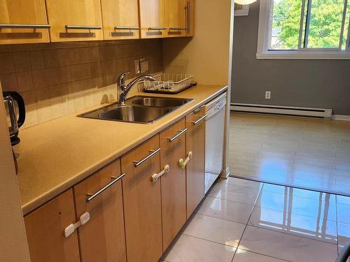 Cuisine - 144 Rue Landry, Saint-Eustache, QC - Indoor Photo Showing Kitchen With Double Sink